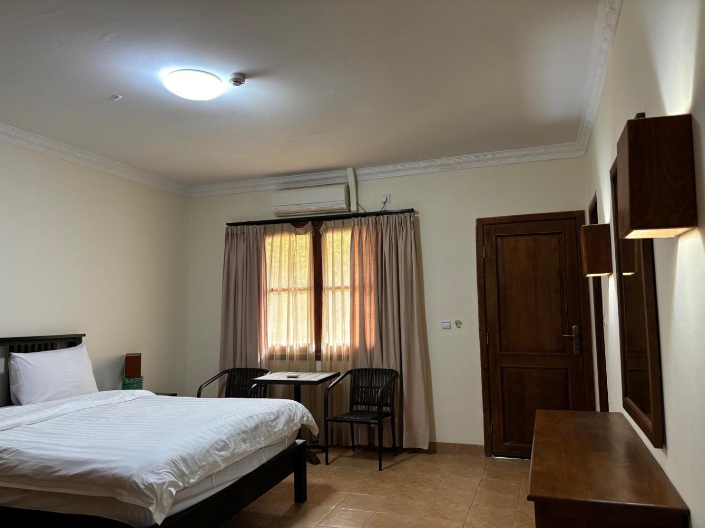 Palm Malinamoc Hotel Dili Extérieur photo